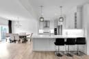 154 Buckskin Way, Cochrane, AB  - Indoor Photo Showing Kitchen With Upgraded Kitchen 