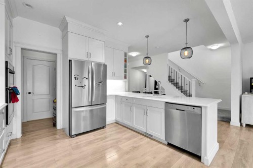 154 Buckskin Way, Cochrane, AB - Indoor Photo Showing Kitchen With Stainless Steel Kitchen