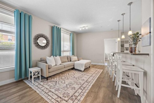 118-3600 15A Street Sw, Calgary, AB - Indoor Photo Showing Living Room