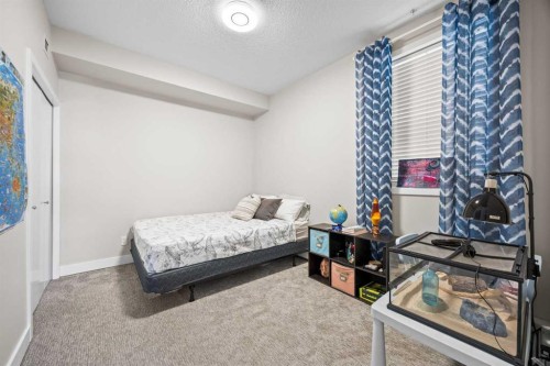 118-3600 15A Street Sw, Calgary, AB - Indoor Photo Showing Bedroom