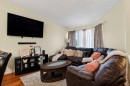403 Shawinigan Drive Sw, Calgary, AB  - Indoor Photo Showing Living Room 