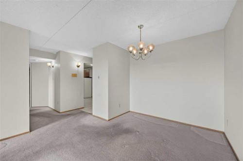 803-5204 Dalton Drive Nw, Calgary, AB - Indoor Photo Showing Other Room