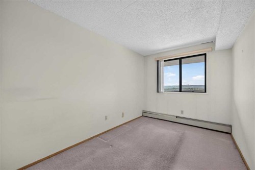 803-5204 Dalton Drive Nw, Calgary, AB - Indoor Photo Showing Other Room