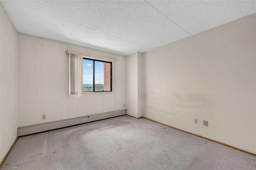 803-5204 Dalton Drive Nw, Calgary, AB - Indoor Photo Showing Other Room