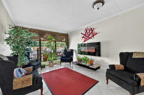 803-5204 Dalton Drive Nw, Calgary, AB - Indoor Photo Showing Living Room