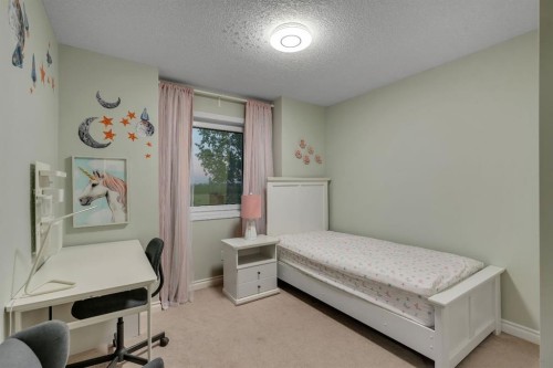 112 Pinto Lane Se, Airdrie, AB - Indoor Photo Showing Bedroom