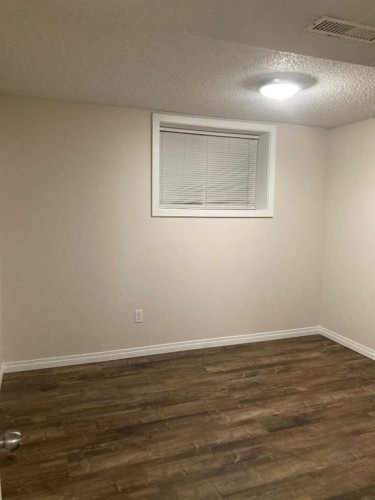 1611 Olympia Drive Se, Calgary, AB - Indoor Photo Showing Other Room