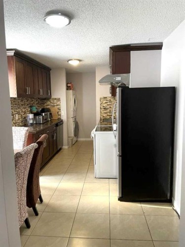 1611 Olympia Drive Se, Calgary, AB - Indoor Photo Showing Kitchen