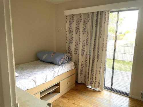 1611 Olympia Drive Se, Calgary, AB - Indoor Photo Showing Bedroom