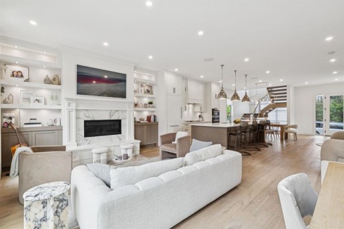 4407 17 Street Sw, Calgary, AB - Indoor Photo Showing Living Room With Fireplace