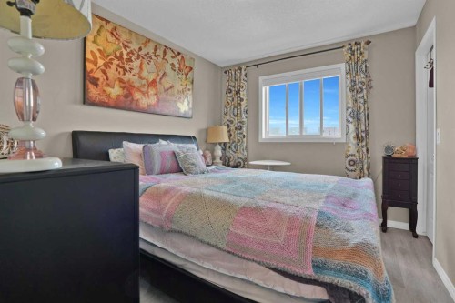 31 Walden Manor Se, Calgary, AB - Indoor Photo Showing Bedroom