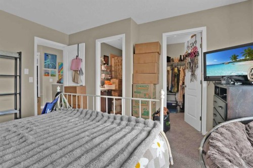 31 Walden Manor Se, Calgary, AB - Indoor Photo Showing Bedroom