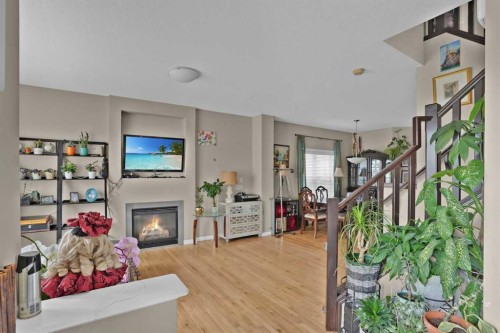 31 Walden Manor Se, Calgary, AB - Indoor With Fireplace