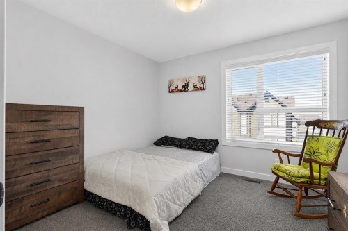20 Evanscrest Park Nw, Calgary, AB - Indoor Photo Showing Bedroom