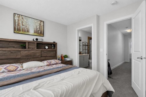 20 Evanscrest Park Nw, Calgary, AB - Indoor Photo Showing Bedroom