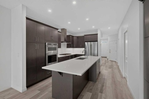 358 Marina Cove Se, Calgary, AB - Indoor Photo Showing Kitchen With Upgraded Kitchen