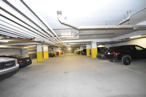 14605 Shawnee Gate Sw, Calgary, AB - Indoor Photo Showing Garage