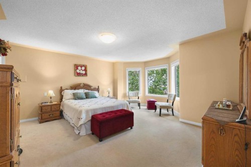 207 Hamptons Drive Nw, Calgary, AB - Indoor Photo Showing Bedroom