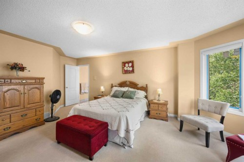 207 Hamptons Drive Nw, Calgary, AB - Indoor Photo Showing Bedroom