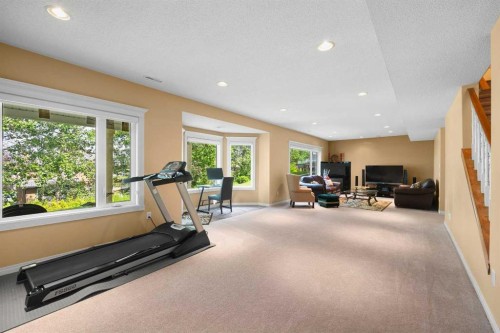 207 Hamptons Drive Nw, Calgary, AB - Indoor Photo Showing Gym Room