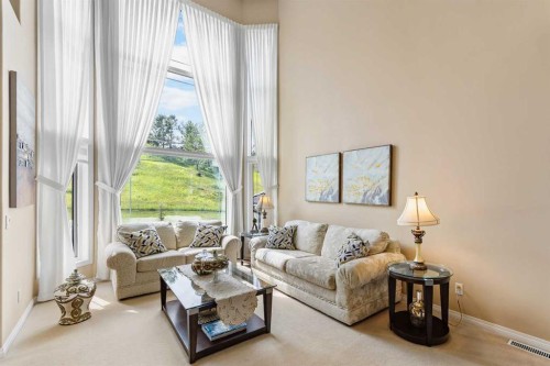 207 Hamptons Drive Nw, Calgary, AB - Indoor Photo Showing Living Room