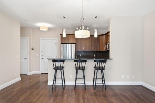 2208-15 Sunset Square, Cochrane, AB - Indoor Photo Showing Kitchen