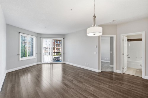2208-15 Sunset Square, Cochrane, AB - Indoor Photo Showing Other Room