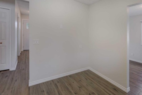 452 Queen Alexandra Way Se, Calgary, AB - Indoor Photo Showing Other Room