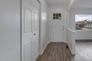 452 Queen Alexandra Way Se, Calgary, AB  - Indoor Photo Showing Other Room 
