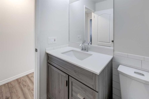 452 Queen Alexandra Way Se, Calgary, AB - Indoor Photo Showing Bathroom