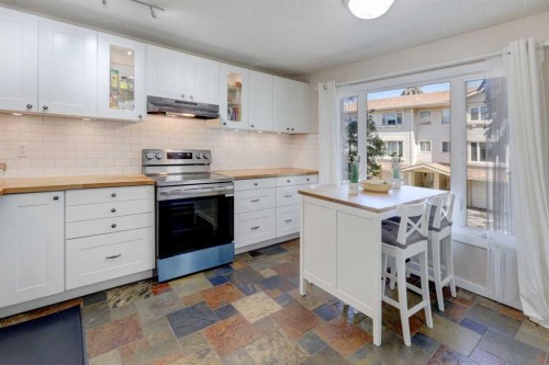 738 Queenston Terrace Se, Calgary, AB - Indoor Photo Showing Kitchen