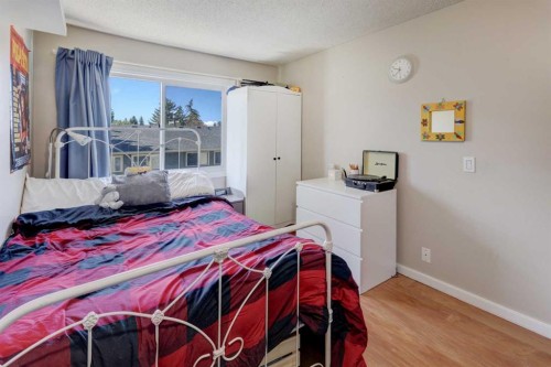 738 Queenston Terrace Se, Calgary, AB - Indoor Photo Showing Bedroom