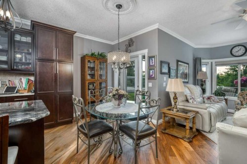 61 River Heights View, Cochrane, AB - Indoor Photo Showing Dining Room