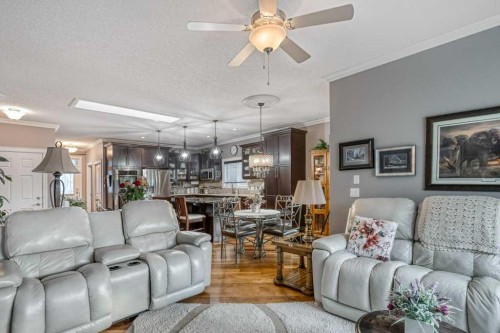 61 River Heights View, Cochrane, AB - Indoor Photo Showing Living Room