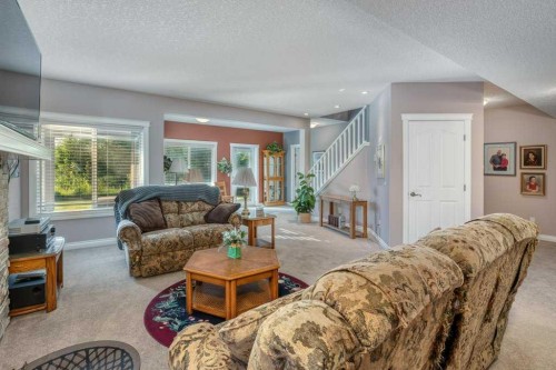 61 River Heights View, Cochrane, AB - Indoor Photo Showing Living Room