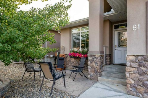 61 River Heights View, Cochrane, AB - Outdoor With Deck Patio Veranda