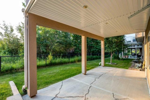 61 River Heights View, Cochrane, AB - Outdoor With Deck Patio Veranda