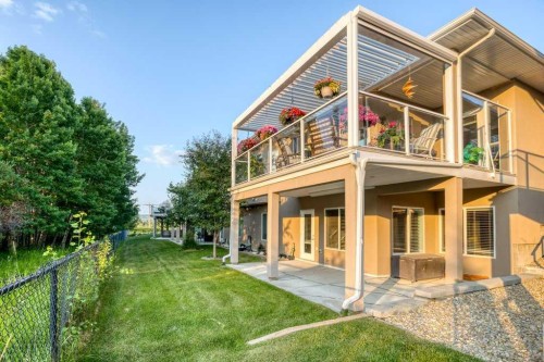 61 River Heights View, Cochrane, AB - Outdoor With Deck Patio Veranda