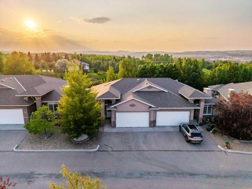 61 River Heights View, Cochrane, AB - Outdoor With Facade
