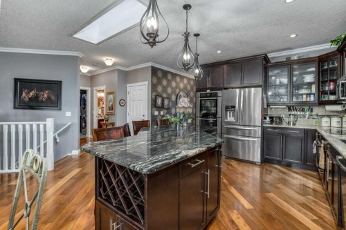 61 River Heights View, Cochrane, AB - Indoor Photo Showing Kitchen With Upgraded Kitchen