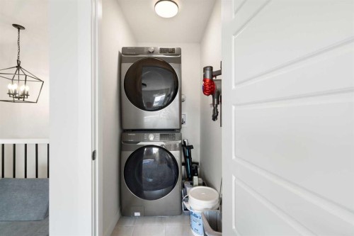 4 Mill Road, Cochrane, AB - Indoor Photo Showing Laundry Room