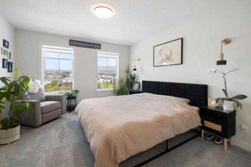4 Mill Road, Cochrane, AB - Indoor Photo Showing Bedroom