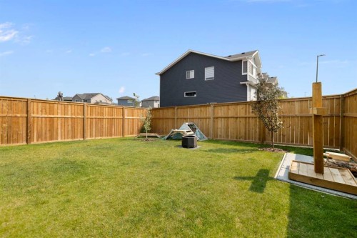 4 Mill Road, Cochrane, AB - Outdoor With Backyard