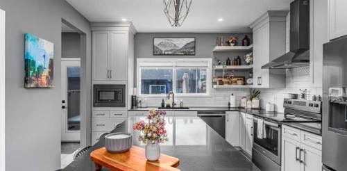 250 Belmont Heath Sw, Calgary, AB - Indoor Photo Showing Kitchen With Upgraded Kitchen