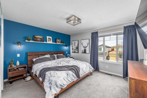 250 Belmont Heath Sw, Calgary, AB - Indoor Photo Showing Bedroom