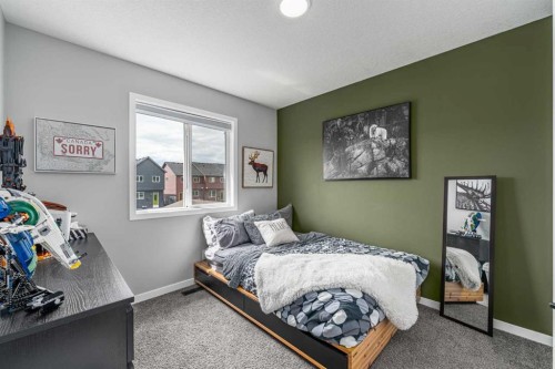 250 Belmont Heath Sw, Calgary, AB - Indoor Photo Showing Bedroom