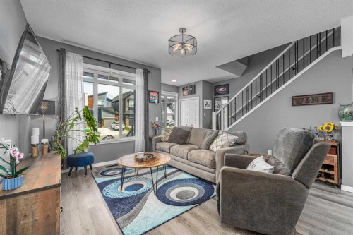 250 Belmont Heath Sw, Calgary, AB - Indoor Photo Showing Living Room