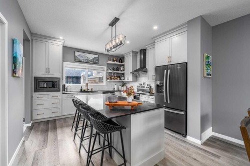 250 Belmont Heath Sw, Calgary, AB - Indoor Photo Showing Kitchen With Upgraded Kitchen