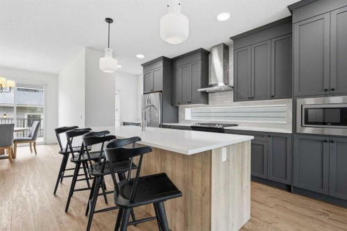 129 Treeline Avenue Sw, Calgary, AB - Indoor Photo Showing Kitchen With Upgraded Kitchen