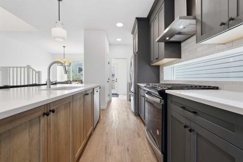 129 Treeline Avenue Sw, Calgary, AB - Indoor Photo Showing Kitchen With Upgraded Kitchen